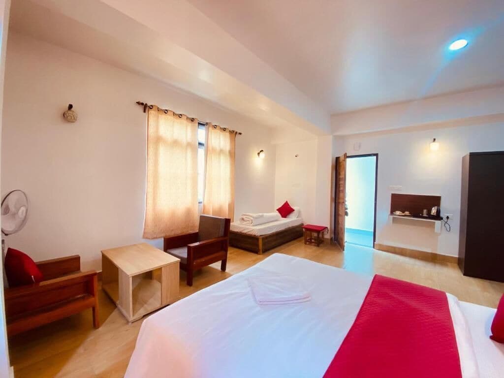 Quarto triplo luxo, vista para a cidade | Wi-Fi de cortesia, roupa de cama