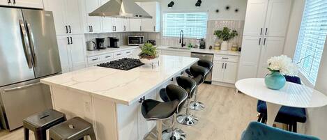Coffee/tea maker, fridge, microwave, oven