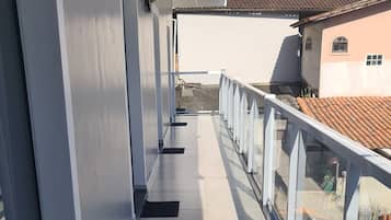 Suíte estúdio conforto, vista para a marina | Detalhe da fachada
