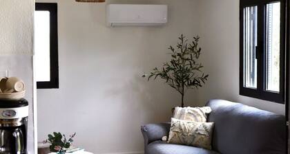 A cozy and comfortable house with a large garden in a beautiful setting!