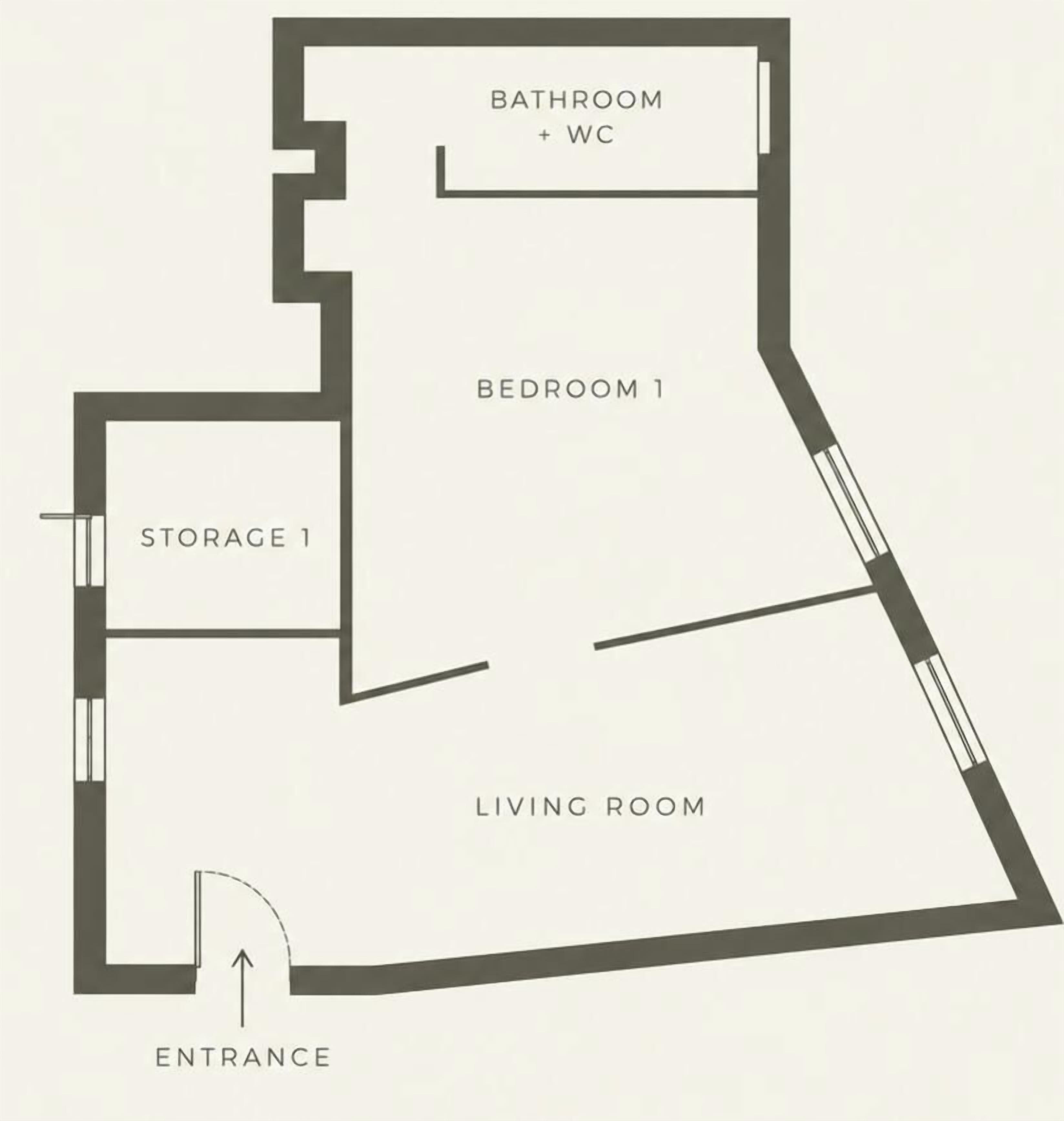 A floor plan with a living room, bedroom 1, storage, and a bathroom with WC.