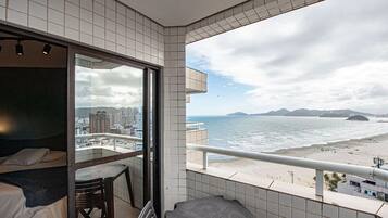 Deluxe Apartment, Balcony, Beach View | Outdoor dining