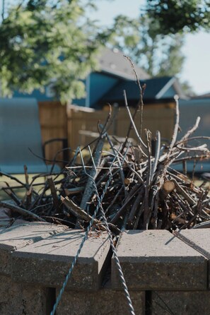A pile of branches and twigs on a concrete surface. - Beach Retreat - Hot Tub - 10 min Walk to Bay Beach (Fort Erie)