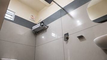 Shower, free toiletries, towels, soap