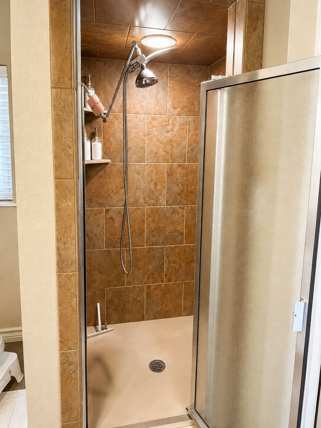 Shower, towels, soap, toilet paper