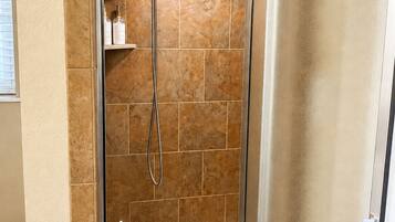 Shower, towels, soap, toilet paper