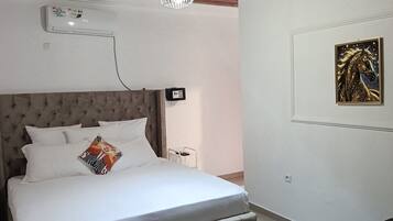 Apartamento familiar, 2 baños | Caja fuerte, cortinas opacas, tabla de planchar con plancha