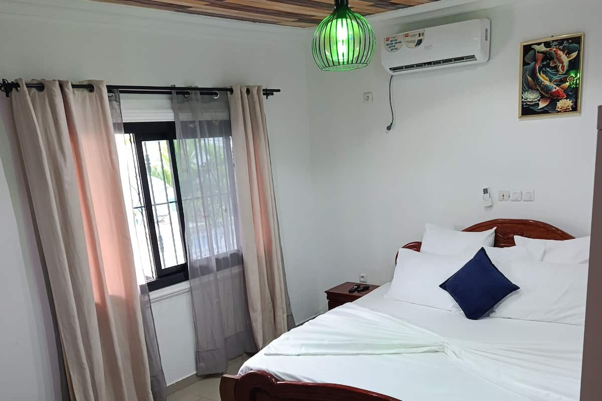 Family Apartment, 2 Bathrooms | In-room safe, blackout drapes, iron/ironing board, bed sheets