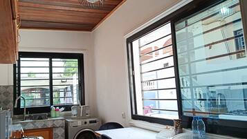 Apartamento superior | Cocina privada | Artículos de limpieza