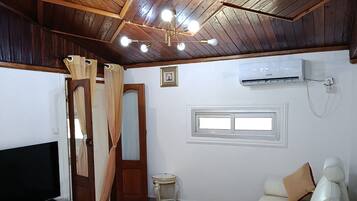 Classic Apartment, 3 Bedrooms | Living area | 32-inch TV with satellite channels