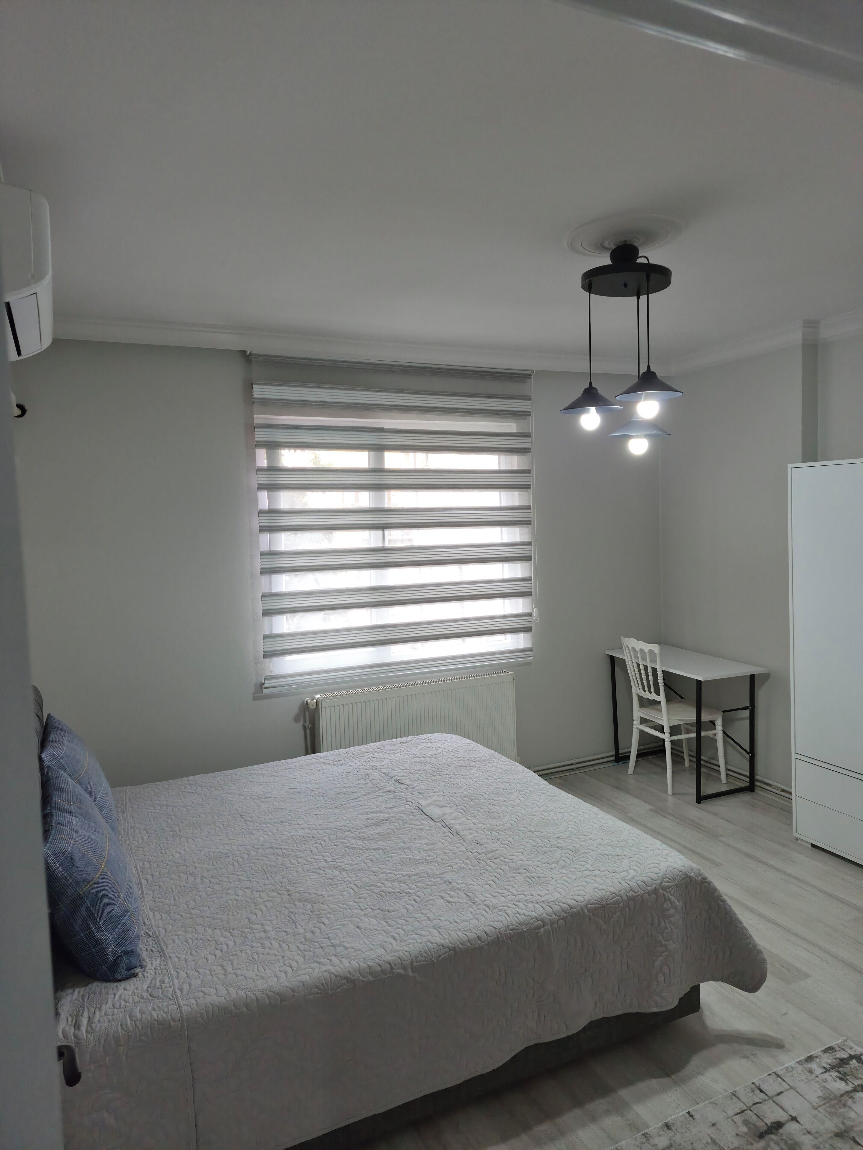 Desk, laptop workspace, blackout curtains, iron/ironing board