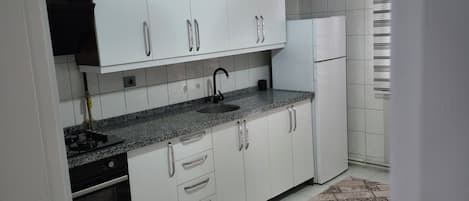 Family Condo, Balcony | Private kitchen
