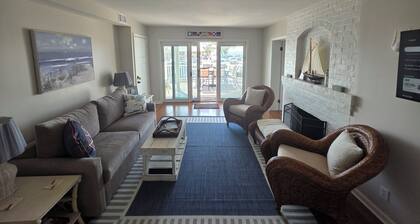 Right across from Beach and Grand Haven Pier! Beautiful Lake and Sunset Views!