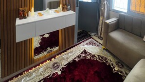 A modern bathroom with a vanity, mirror, and shower area. - Modern Apartment with Wi-Fi and Air Conditioning, Near the Beach and the Medina (Tanger)