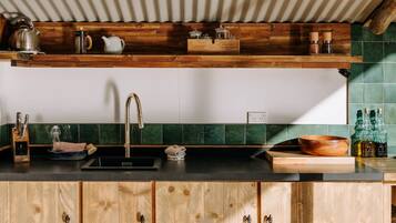 Fridge, stovetop, toaster, cookware/dishes/utensils