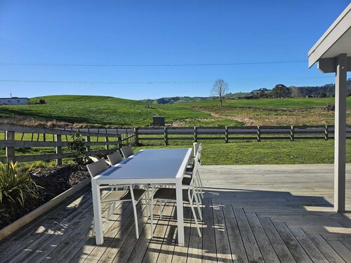 Relax in modern comfort surrounded by rolling hills of the surrounding farm land
