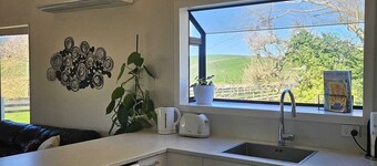 Relax in modern comfort surrounded by rolling hills of the surrounding farm land