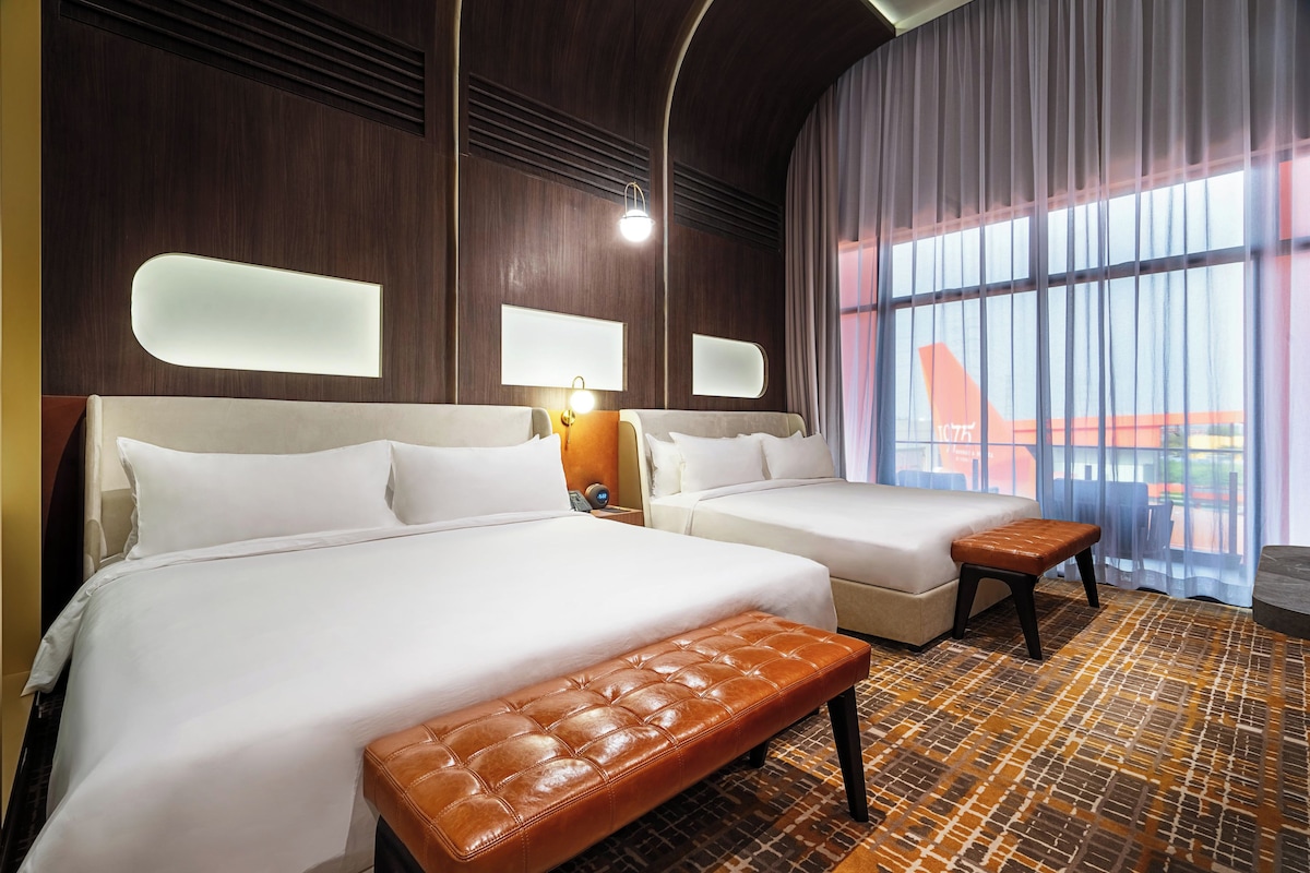 Habitación Deluxe con 2 camas individuales, para no fumadores, balcón | Ropa de cama de alta calidad y minibar