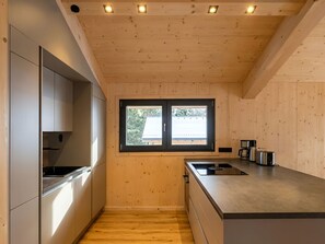 Fridge, oven, dishwasher, cookware/dishes/utensils - 02_NTH031_Sup Chalet mit Sauna und Hot Tub 2 Etage by Interhome (Großveitsch)