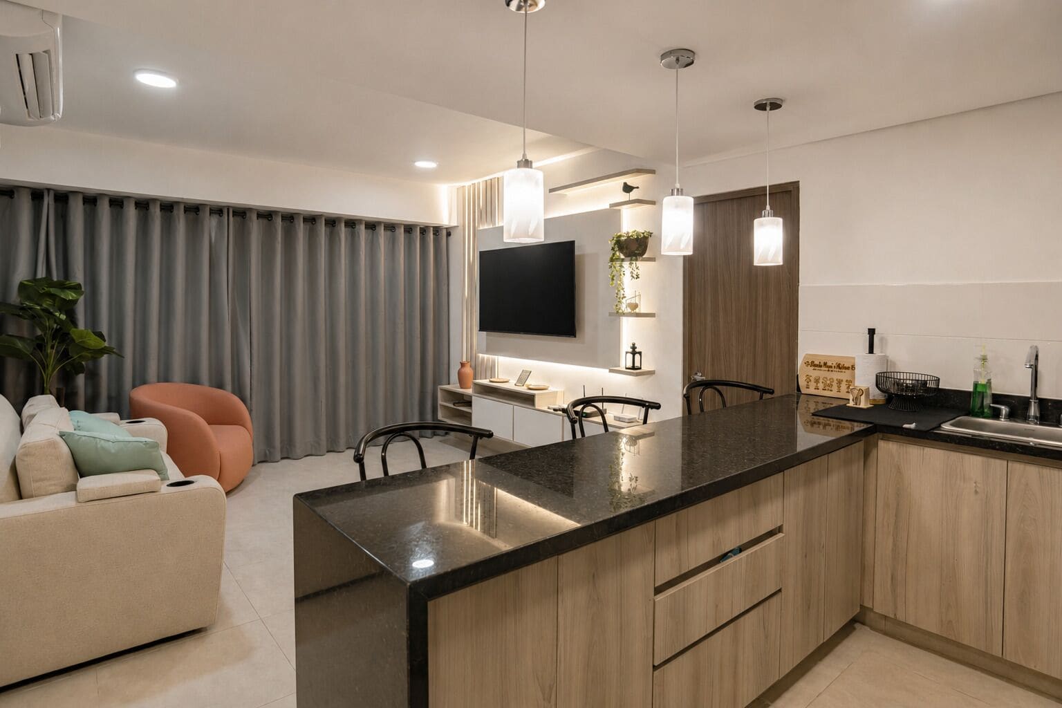 A modern kitchen with a central island, wooden cabinets, and pendant lighting.