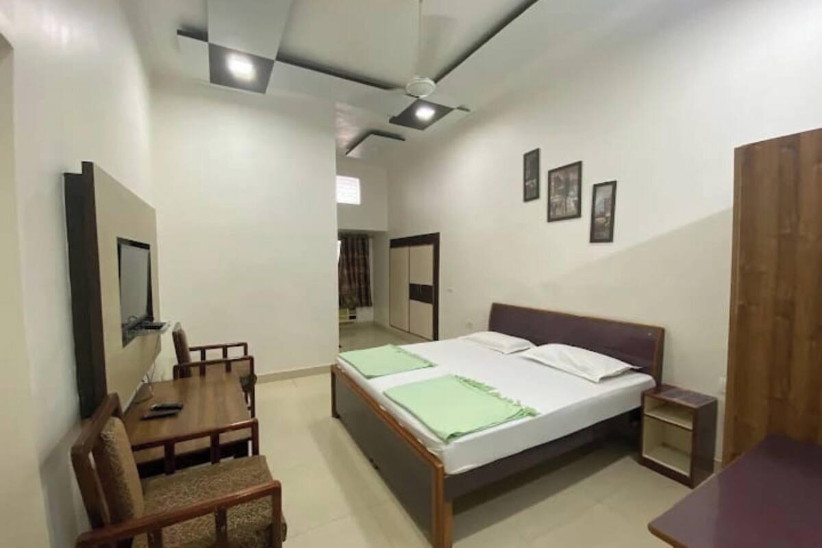 Habitación doble Deluxe | Ropa de cama de alta calidad, edredón y camas con efecto memoria