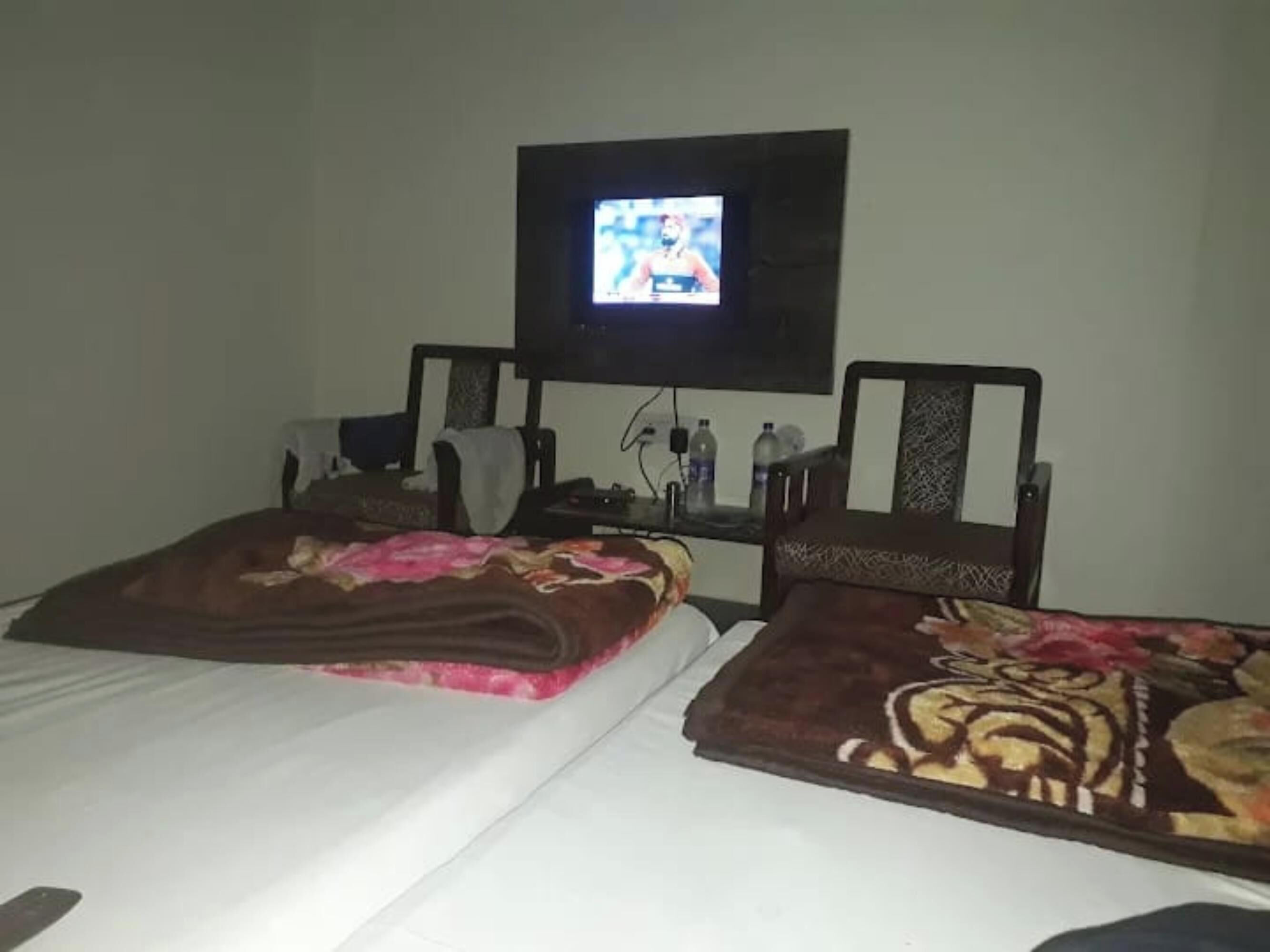 Quadrupla Comfort, vista giardino | Una scrivania, Wi-Fi gratuito