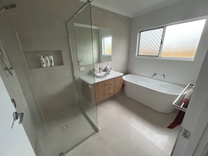 Shower, hair dryer, towels, soap