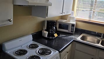 Suite estudio Confort, varias camas, para no fumadores, microondas | Cocina privada | Frigobar, microondas y periquera