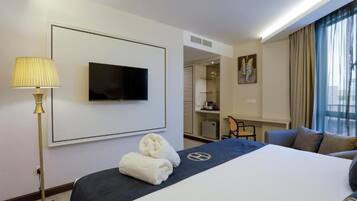 Junior Suite, Non Smoking, City View | In-room safe, iron/ironing board, free WiFi