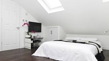Desk, iron/ironing board, travel cot, free WiFi