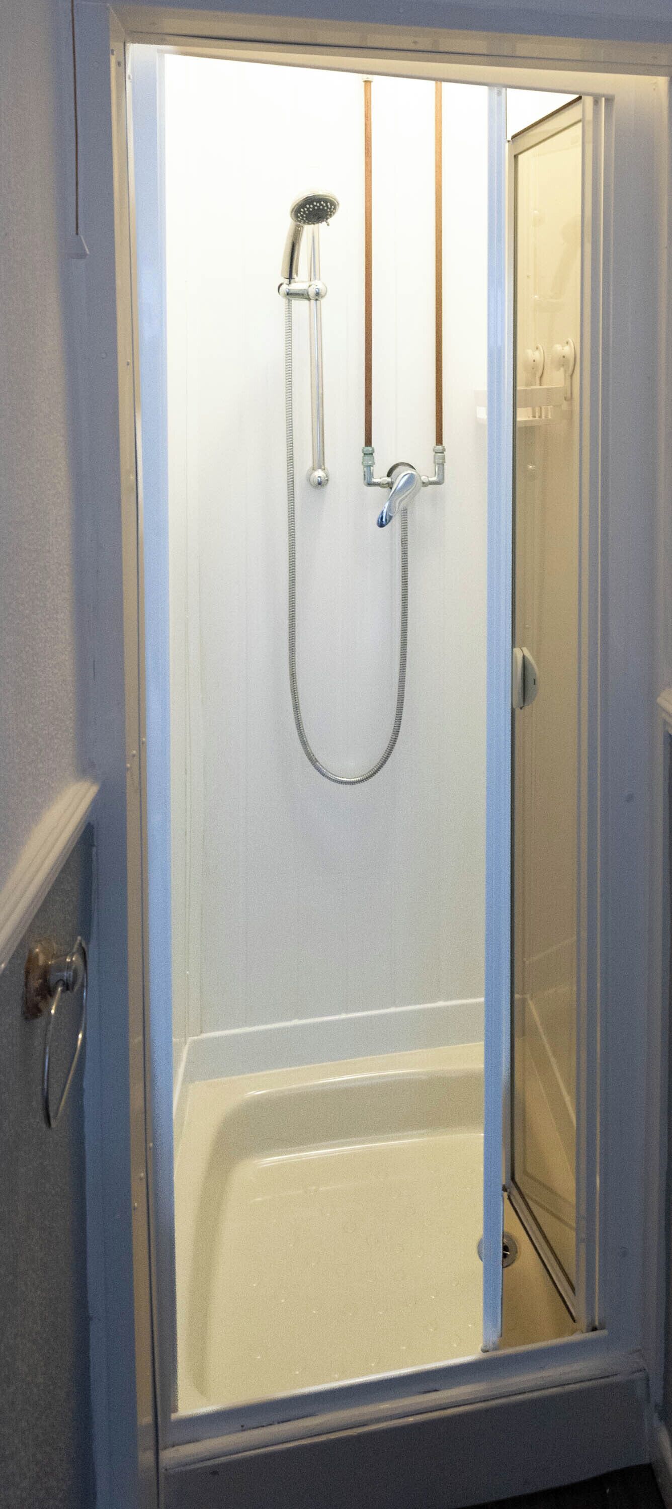 Shower, towels, toilet paper