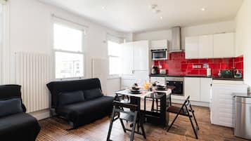 Coffee/tea maker, fridge, microwave, oven
