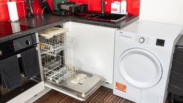 Coffee/tea maker, fridge, microwave, oven