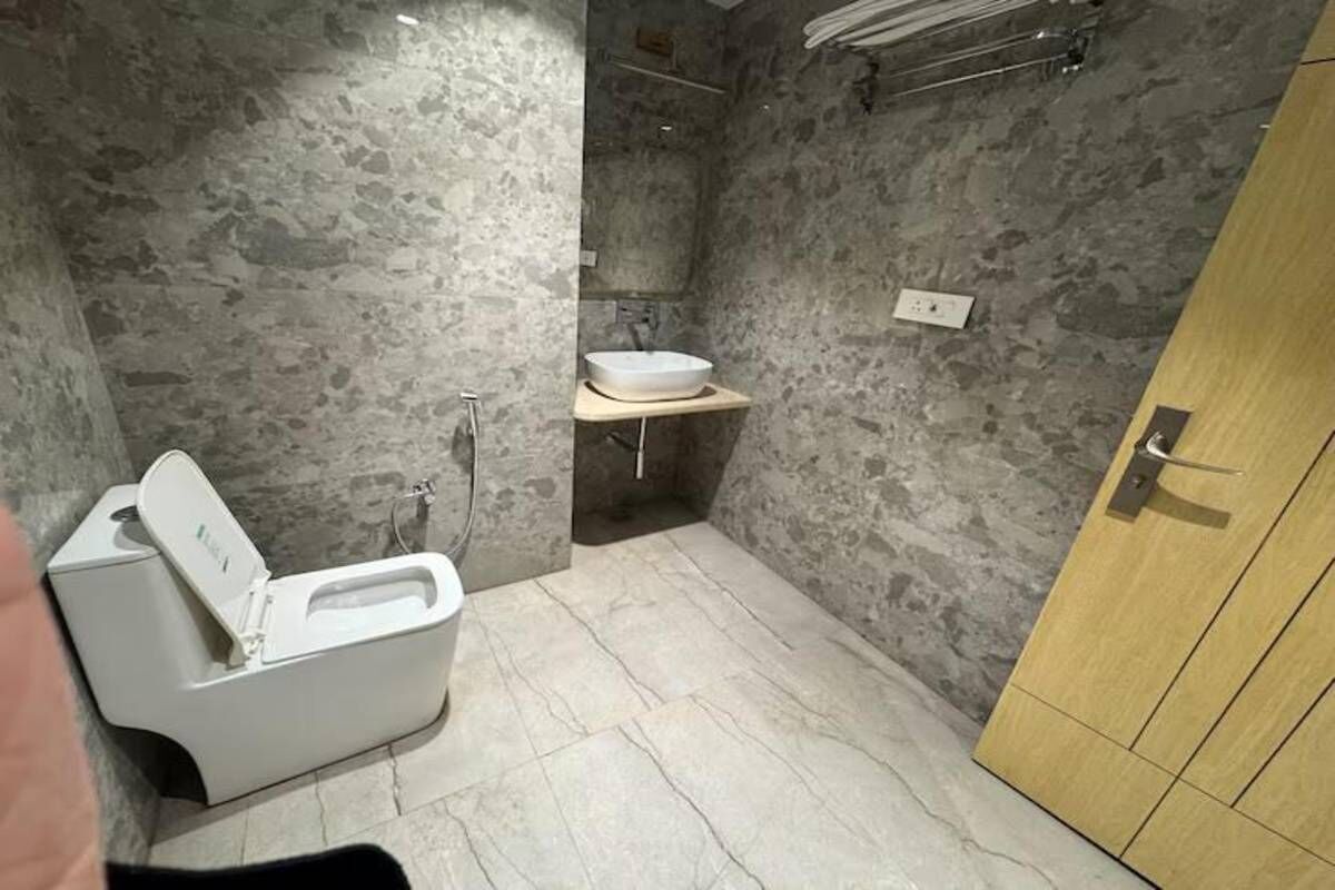 Shower, towels, soap, toilet paper