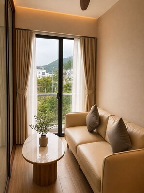 Habitación Deluxe doble, vistas al patio | Zona de estar