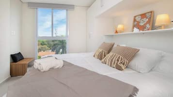 Appartement, balcon, vue ville | Wi-Fi gratuit
