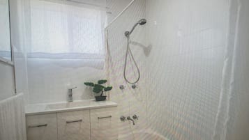 Hair dryer, towels, soap, toilet paper