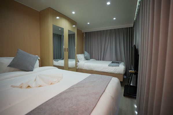 Habitación estándar con 2 camas individuales | Ropa de cama de alta calidad y caja de seguridad en la habitación