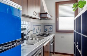 Deluxe Duplex, 3 Bedrooms, Sea View | Private kitchen | Fridge, microwave, oven, stovetop - Mondello Bay - Addaura Apartments (Palermo)