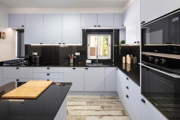 Villa 10 | Private kitchen | Full-size fridge, microwave, oven, stovetop