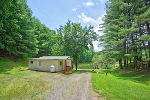 Exterior - Cozy lakeside cabin with peaceful views, a covered porch, fire pit, and private rural getaway. (Galax)