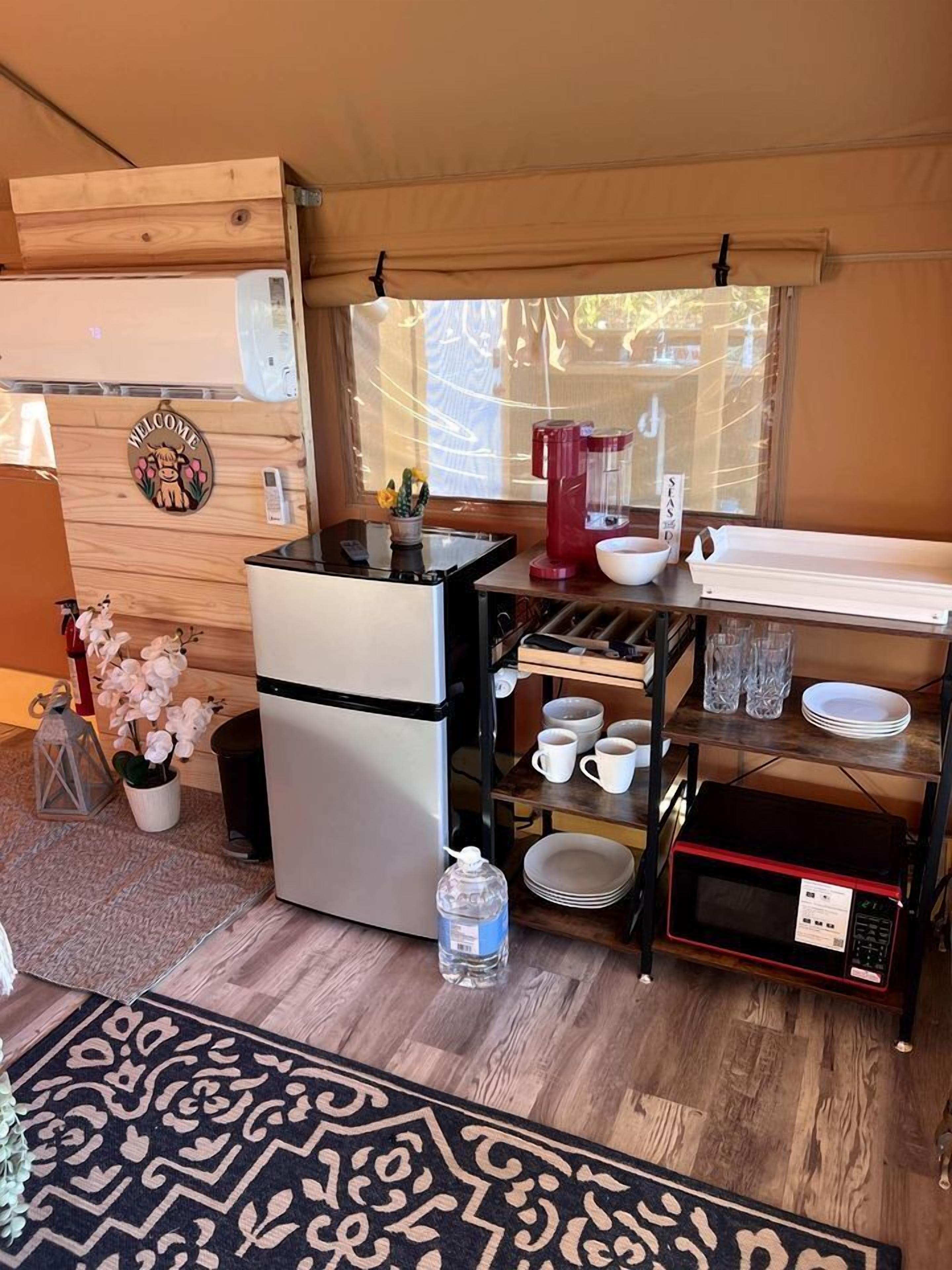 Coffee/tea maker, fridge, microwave, cookware/dishes/utensils