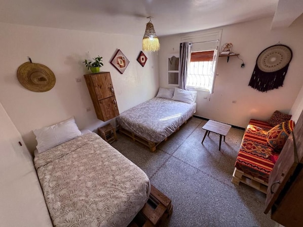 Habitación triple Confort, vista a la playa | Wifi gratis