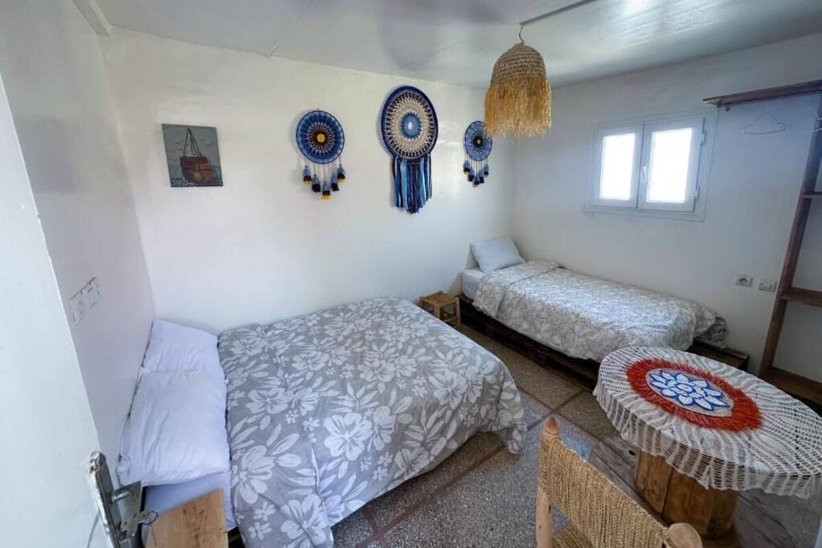 Habitación triple económica, vista a la playa | Wifi gratis