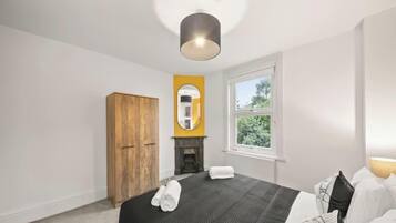4 bedrooms, iron/ironing board, travel cot, WiFi