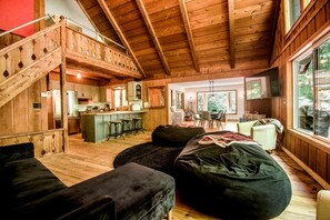 Living area - Incredible Cottage with Private Beach and Indoor and Outdoor Swimming Pool in Bellaire, Michigan (Bellaire)