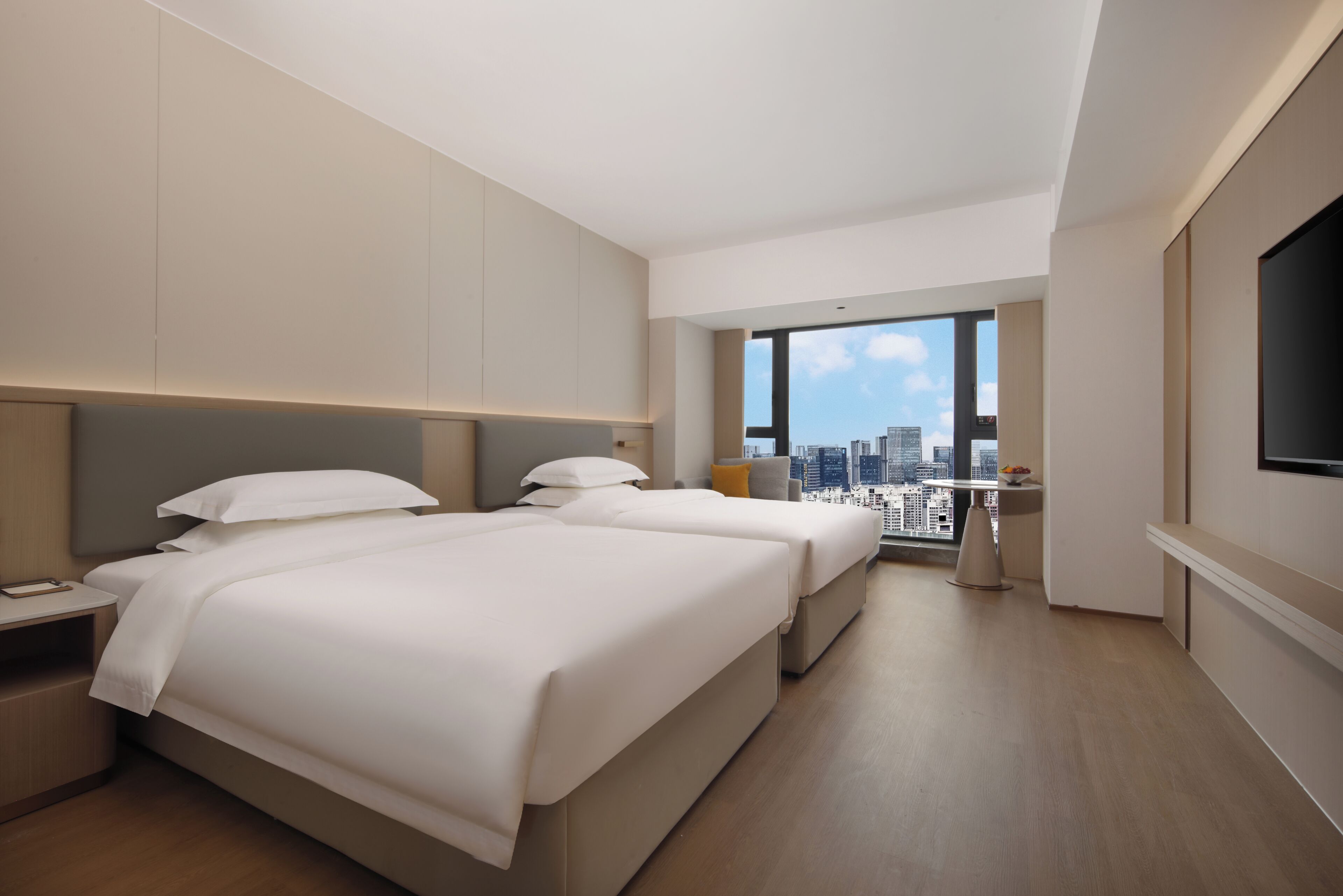Quarto duplo empresarial, para não fumantes, vista para a cidade | Escrivaninha, cortinas blackout, ferros/tábuas de passar roupa