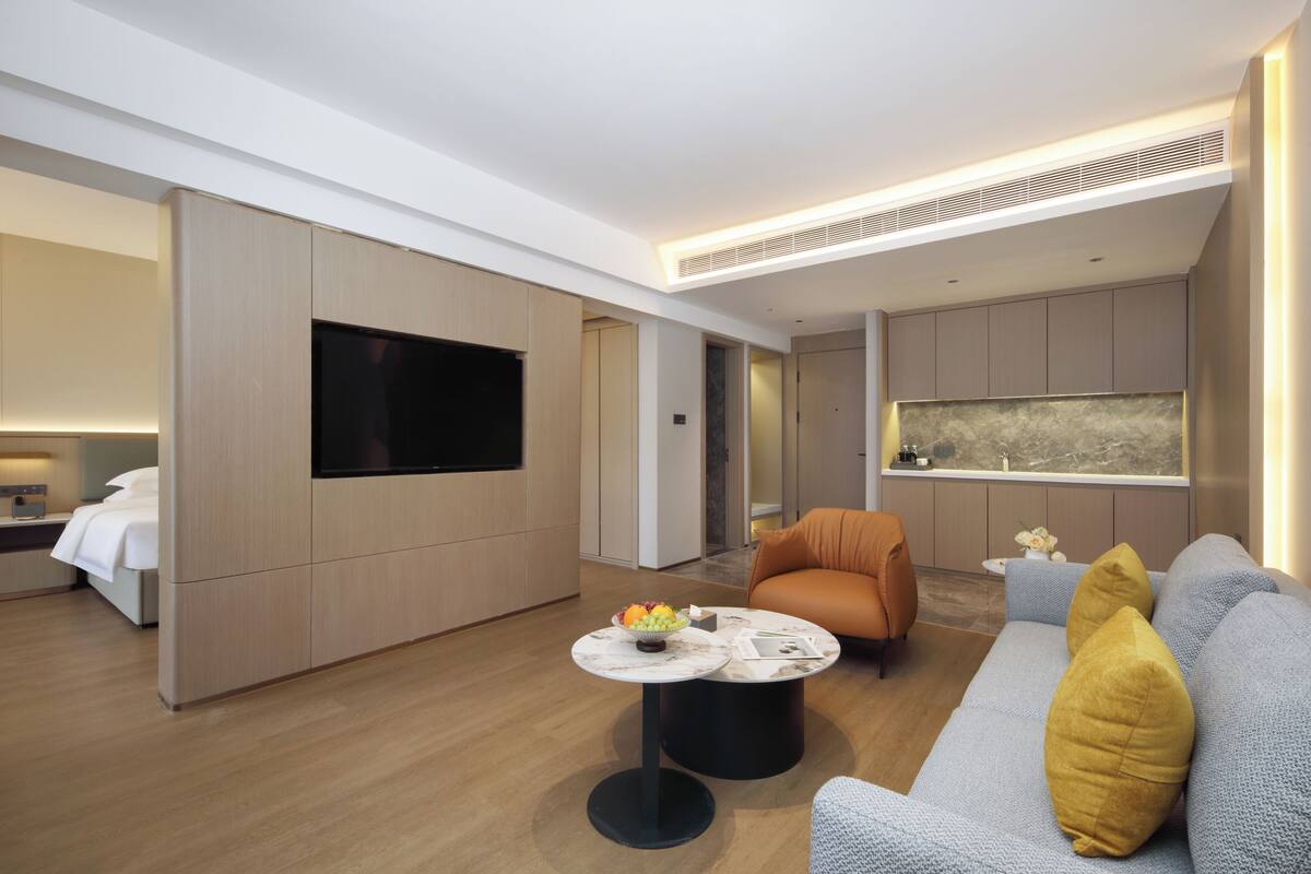 Luxury Suite, Balcony, City View | Premium bedding, down comforters, desk, laptop workspace