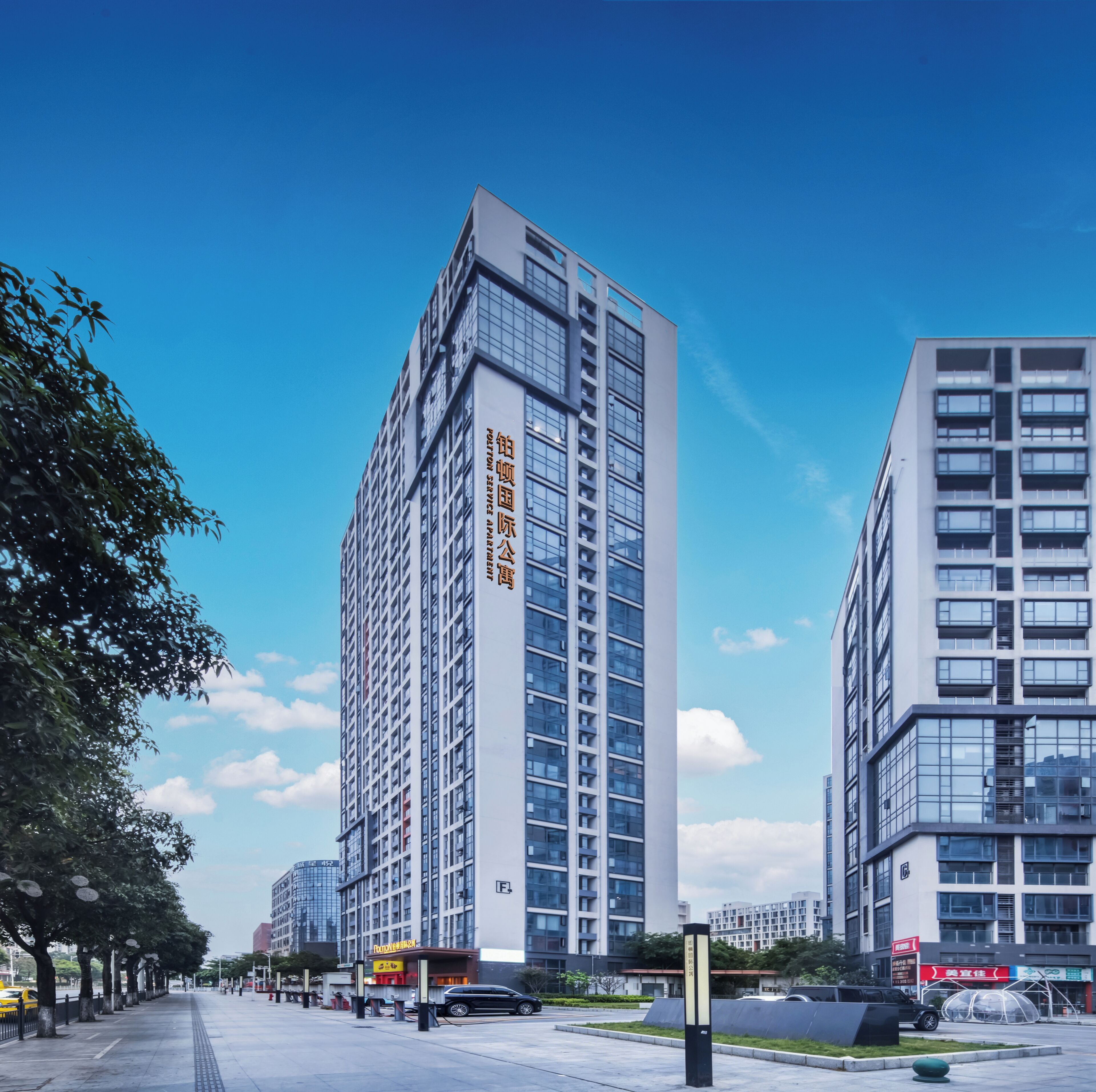 A modern high-rise building with a clear sky.