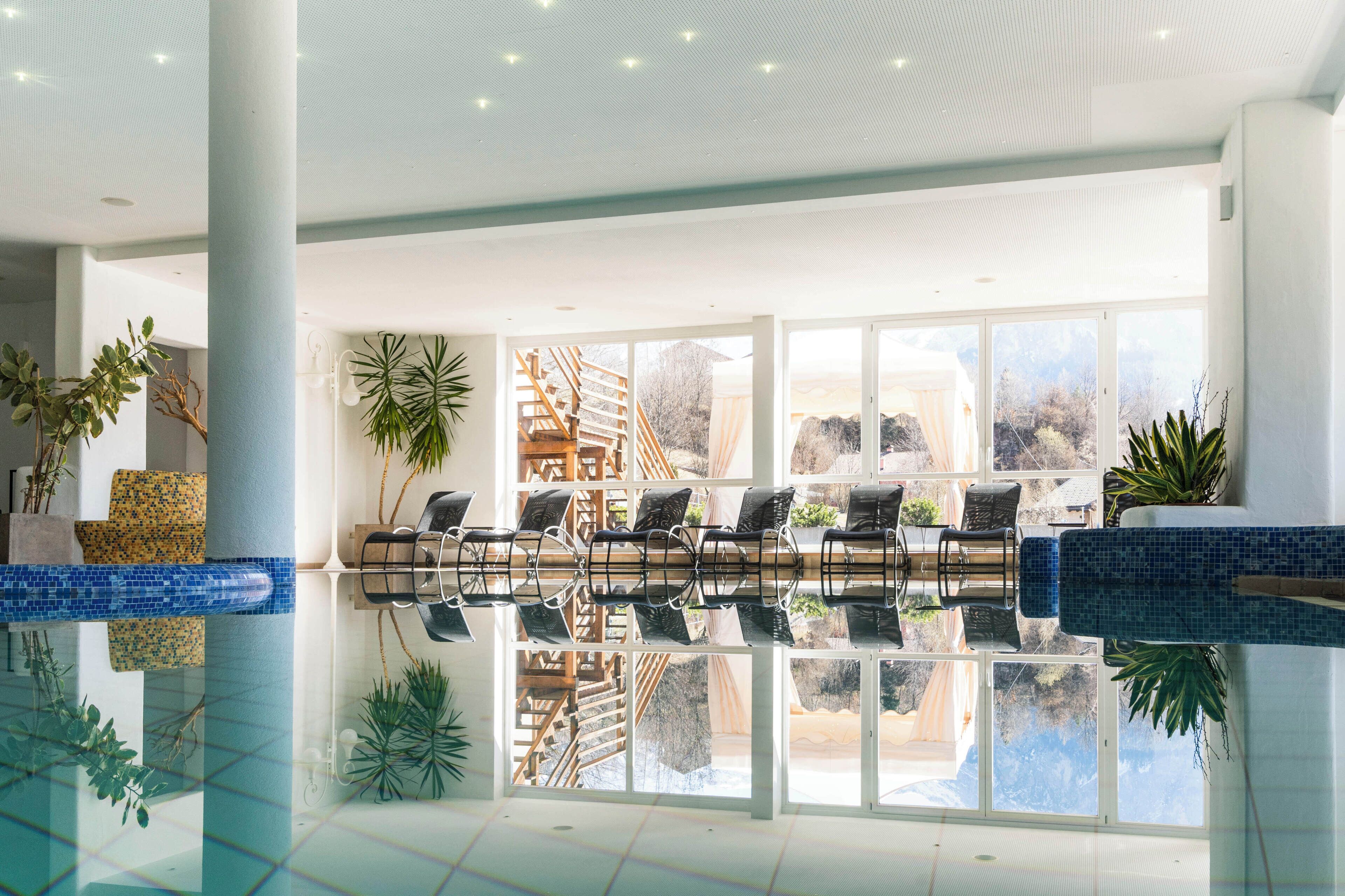 Indoor pool, outdoor pool, pool umbrellas, sun loungers